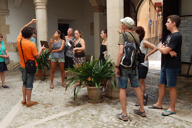 Private walking tour in Palma de Mallorca with local guides. - Markets and Local Life: From Placa Major to SOli Oleoteca