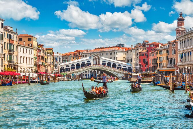 Private Walking Tour of Venice's Old Town with Gondola Ride - Crossing the Rialto Bridge and Its Market Atmosphere