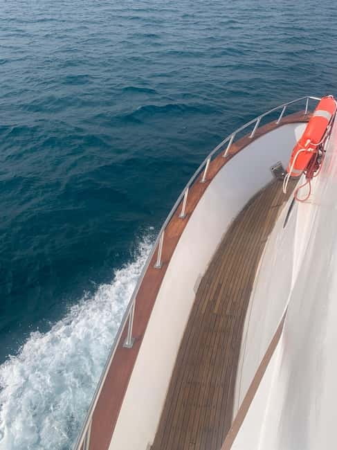 Protaras: 80s and 90s Sunset Cruise with Cypriot Dinner & DJ - Enjoying the Blue Lagoon and Turtle Bay