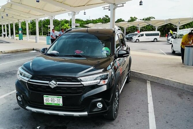 Puerto Aventuras: From/to Cancun Private Airport Transfers - Location and Meeting Points at Cancun Airport