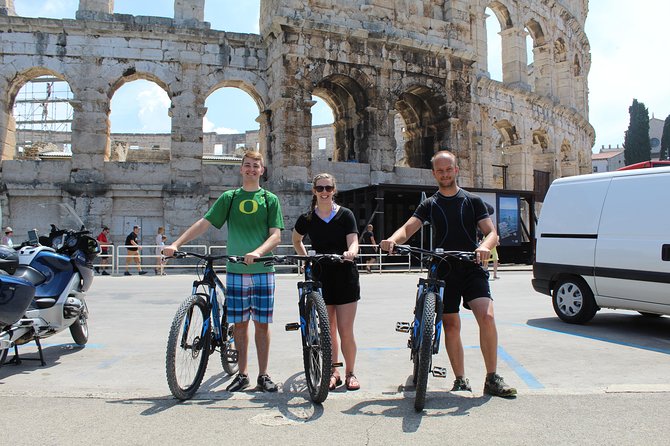 Pula Highlights Bike Adventure - The Scenic Old Town and Port Views from the Bike