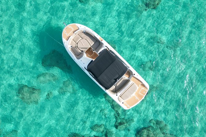 Relax by Boat with Paddle Surfing and Snorkeling in San Antonio - The Experience on the Boat: Music, Drinks, and Atmosphere