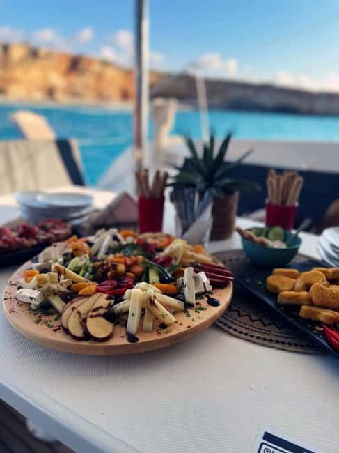 Rethymno: Sailing Catamaran Cruise & Premium Meal & Drinks - Food and Drinks: Mediterranean Feast and Unlimited Refreshments