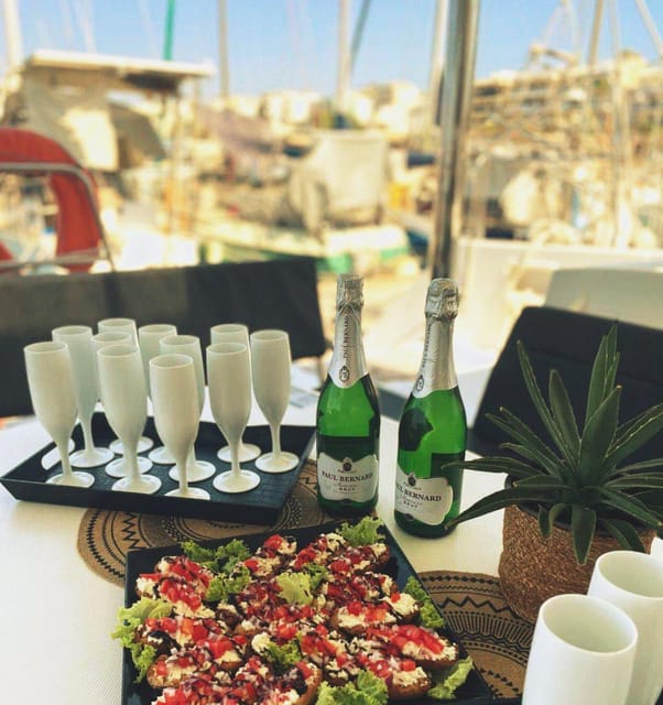Rethymno: Sunset Catamaran Cruise with Wine and Snacks - Key Points