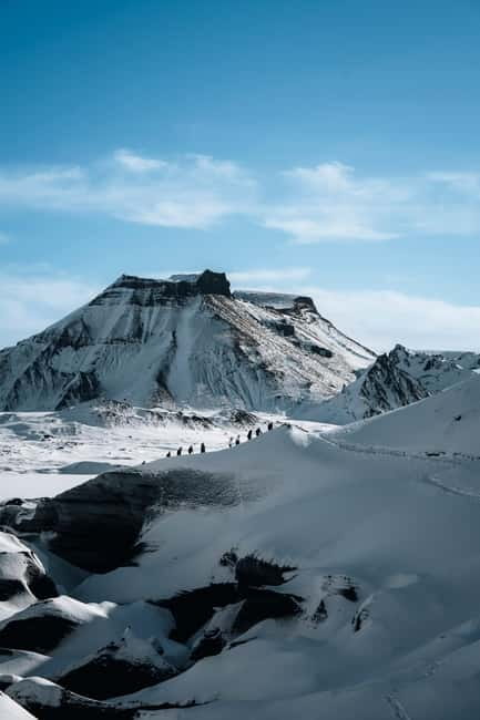 Reykjavik: Katla Ice Cave & South Coast Waterfalls Tour - Scenic Drive and Stops at the Iconic Waterfalls