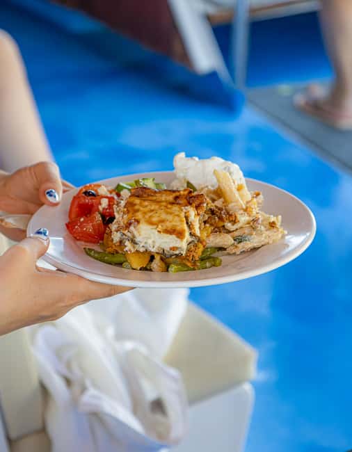 Rhodes: Bay to Bay Cruise with Lunch - Afandou Bay: A Short Swim in a Tranquil Setting