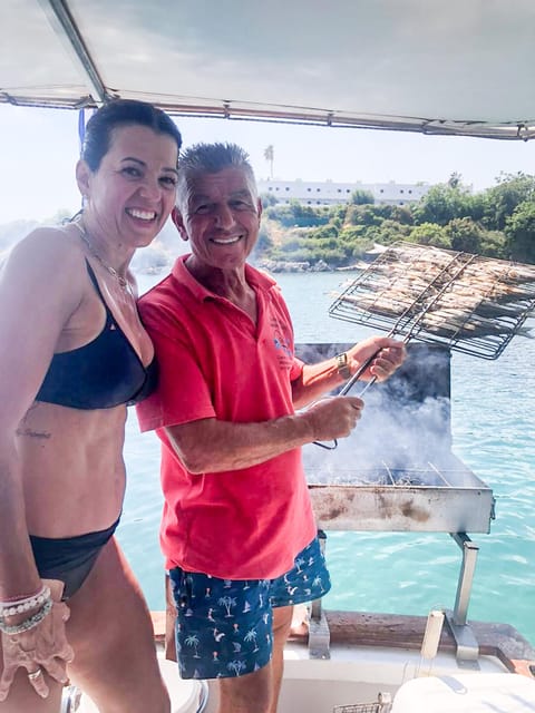 Rhodes: Captain Manolis Fishing Trip with BBQ and Swimming - Swimming, Snorkeling, and Marine Life Near Rhodes Beaches