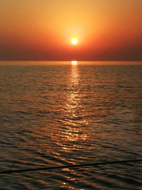 Rhodes: Sunset Catamaran Cruise with Snack, Fruits & Drinks - Rhodes Sunset Catamaran Cruise with Snack, Fruits & Drinks: A Relaxing Evening at Sea