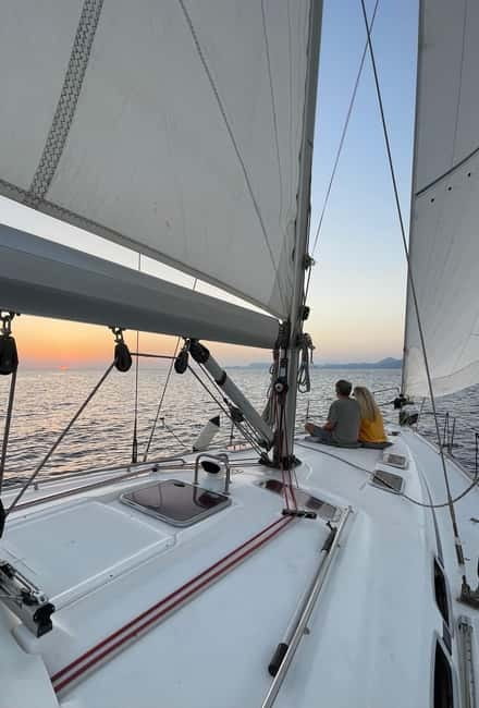 Rhodes: Sunset Catamaran Cruise with Snack, Fruits & Drinks - Key Points