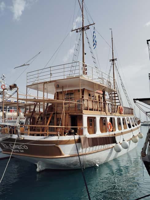 Rhodes: Sunset cruise, swimming stop, snaks & Drinks - Key Points