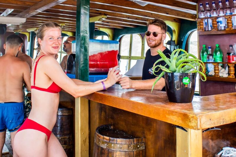 Rhodes: Sunset Cruise with Greek BBQ and Unlimited Drinks - Key Points