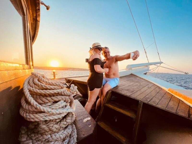 Rhodes: Sunset Cruise with Greek BBQ and Unlimited Drinks - Embarking at Mandraki Harbour