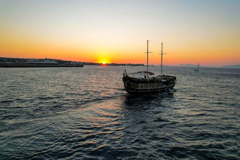 Rhodes: Sunset Cruise with Greek BBQ and Unlimited Drinks - The Stops: Kalithea Springs and Rhodes Town