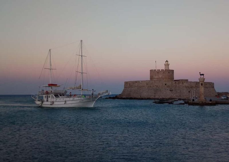 Rhodes: Sunset Cruise with Open Bar, Dinner, & Live Music - Practical Details: Meeting Point and Packing Tips