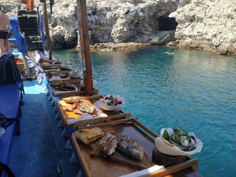 Rhodes Town: Fishing Boat Trip with Fish Meal and Swim Stops - Snorkeling at Hidden Coves with Marine Life