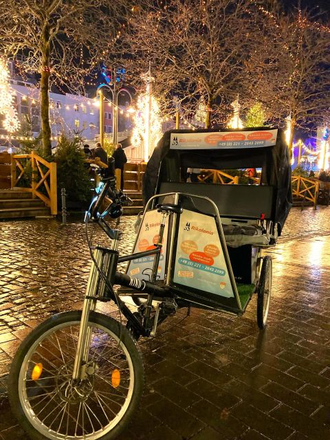 Rickshaw Glühwein Ride - Enjoying Views of the Rhine and Old Town