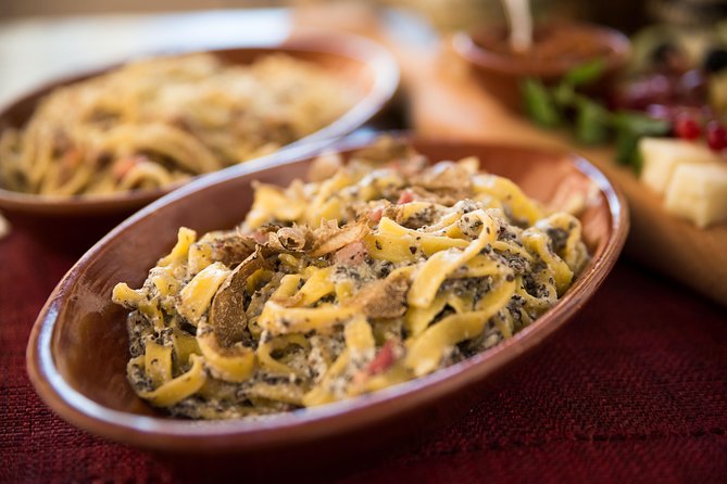 Ride an e-bike along the Appian Way from Rome to Castel Gandolfo. - Indulge in Italian Cuisine: Lunch at a Traditional Osteria