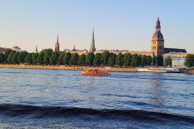 Riga: Evening or Sunset Boat Tour with Drink and Audio Guide - Practicalities: Accessibility and Timing