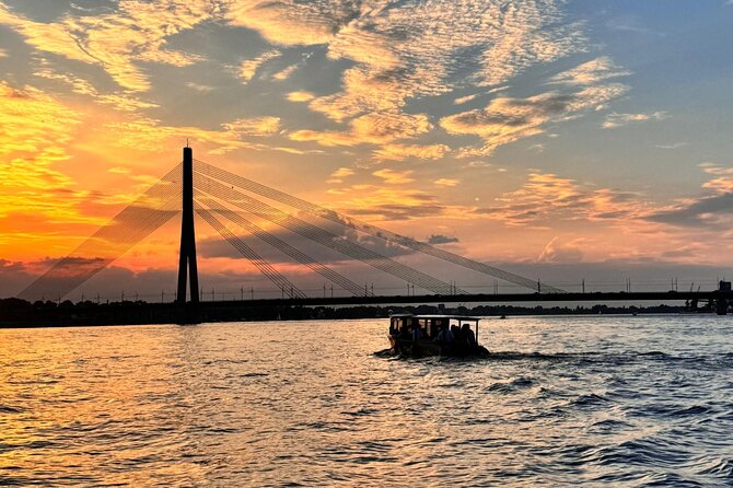 Riga: Evening or Sunset Boat Tour with Drink and Audio Guide - Weather and Cancellation Considerations