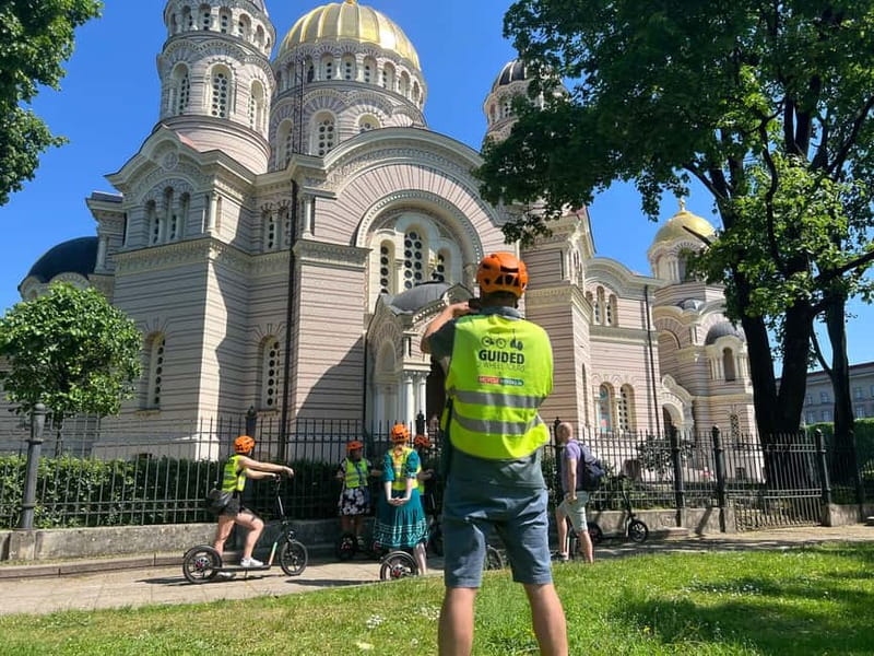 Riga Highlight Big wheel e-scooter Group or Private tour - Key Points