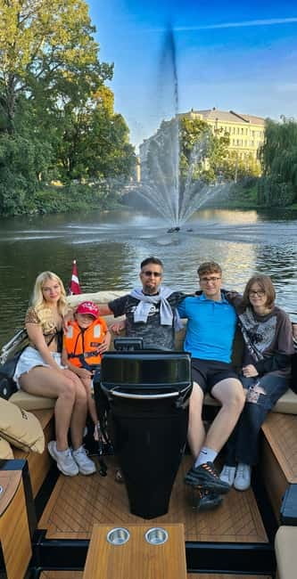 Riga: Private Boat Tour City Canal and Daugava River - The Captain and Commentary: Local Knowledge in Action