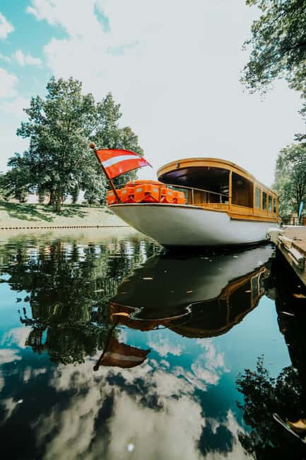 Riga: Private Boat Tour with Snacks and Drinks - Cruising Along the Riga Canal and Its Green Banks