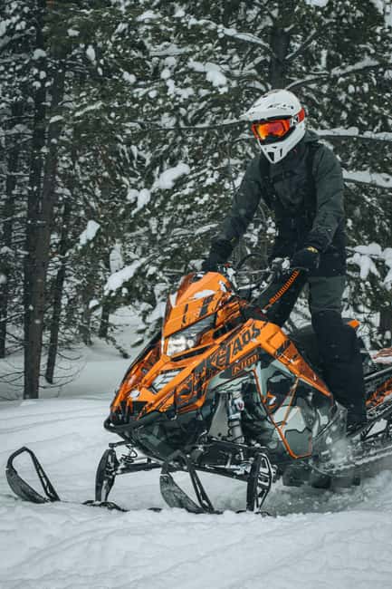 Riga: Snowmobile Adventure with Transfer - Key Points