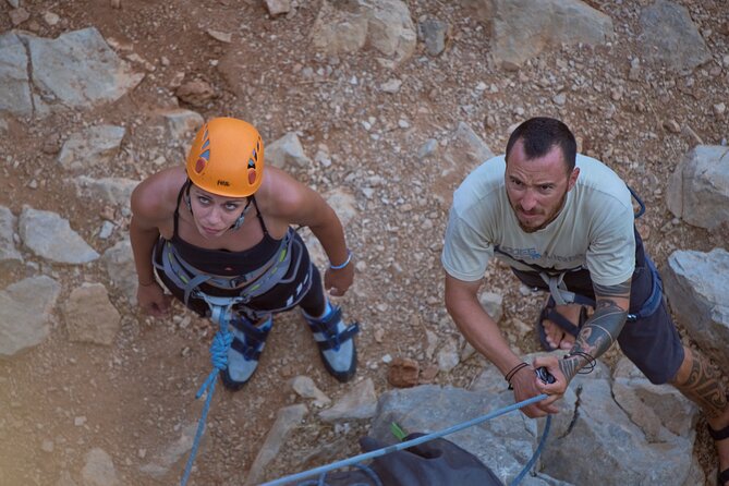 Rock Climbing & Rappelling for the real thrill seekers! - Rappelling in Front of a Cave: The Tour’s Showstopper