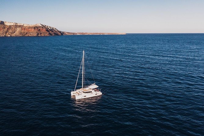 Romantic Sunset Catamaran Caldera Cruise incl. Meal & Drinks - Dining on Board: Greek Barbecue and Refreshments