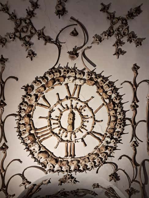 Rome: Capuchin Crypts ticket entrance with audio guide - Walking Through the Crypt Entrance and Historic Corridor