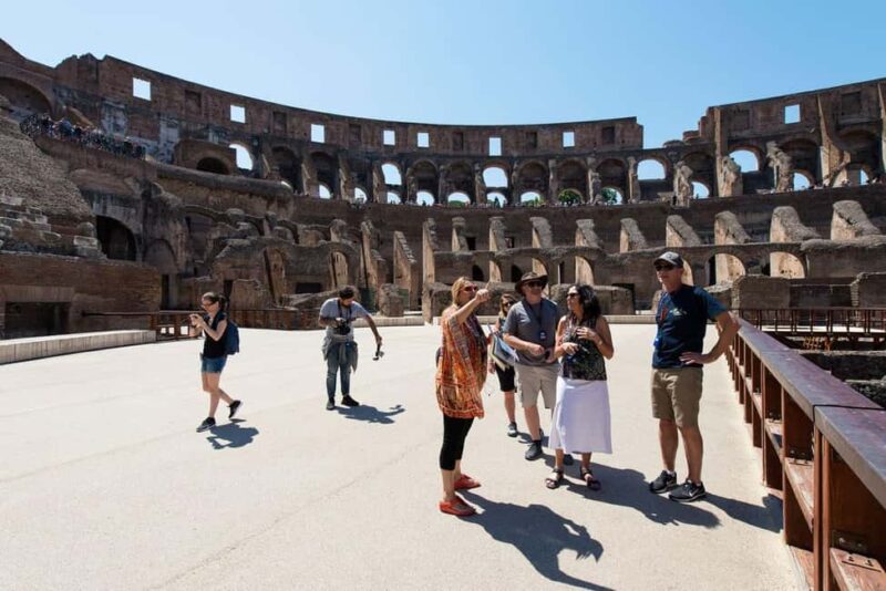 Rome: Colosseum Arena Floor, Forum, and Trevi Fountain Tour - Guide Expertise and Tour Atmosphere