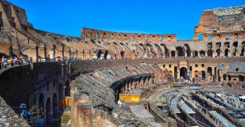 Rome: Colosseum, Roman Forum, and Palatine Hill Ancient Tour - Walking Through the Roman Forum and Its Ruins