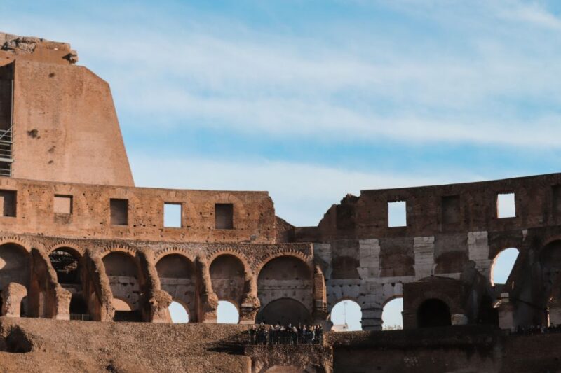 Rome: Colosseum, Roman Forum and Palatine Hill Guided Tour - Exploring the Roman Forum’s Ancient Streets