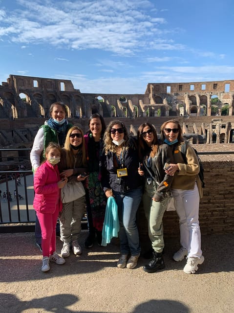 Rome: Colosseum, Roman Forum and Palatine hill guided tour - Walking Through the Roman Forum’s Ancient Ruins
