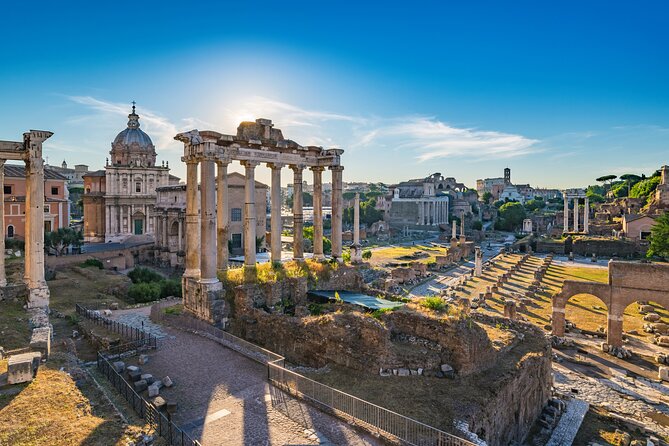Rome: Colosseum, Roman Forum and Palatine Hill Tour - Walking Through the Roman Forum’s Ruins