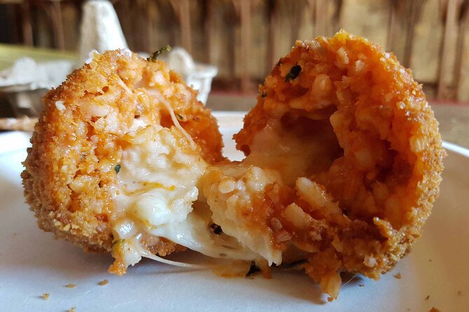 Rome: Lip Smacking 4 hours Foodie Tours in golf cart - Testaccio Food Market: Taste Rome Like a Local