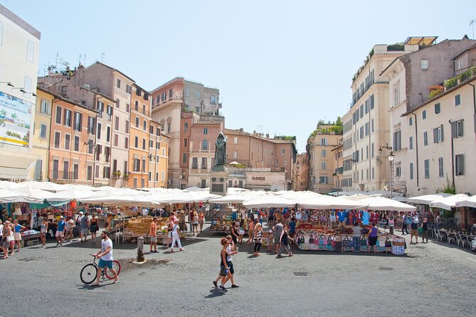 Rome: Pantheon, Trevi Fountain and Roman Squares Guided Tour - Exploring Piazza Navona’s Artistic Elegance and Bustling Atmosphere