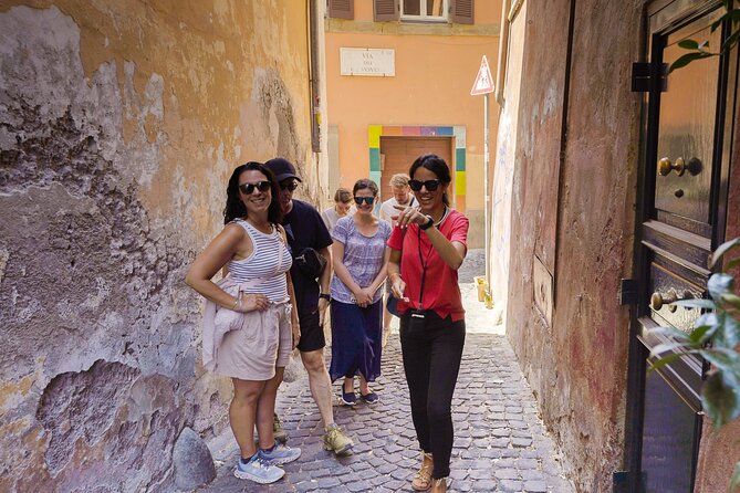 Rome: Trastevere with Underground Crypt & Jewish Ghetto tour - Crossing to Tiber Island and Its Historic Significance