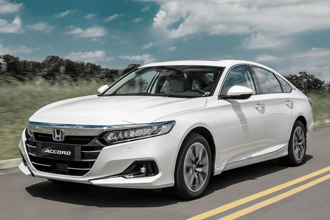 Round Trip Transfer from Madrid Airport MAD to Madrid by Sedan - Door-to-Door Service to Madrid City Center Hotels