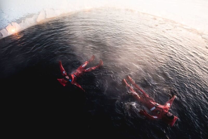 Rovaniemi: Arctic Ice Floating and Northern Lights Tour - Warm Up with Hot Drinks and Snacks by the Fire