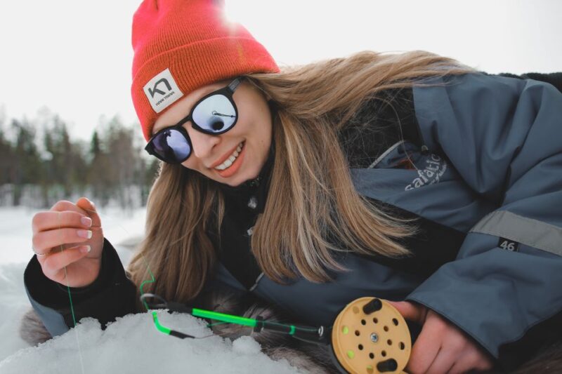 Rovaniemi: Guided Ice Fishing Experience - Warming Up at the Campfire with Hot Drinks