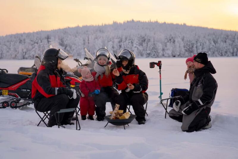 Rovaniemi: Ice Fishing and Snowmobile Tour with Snacks - Snowmobiling onto the Frozen Lake