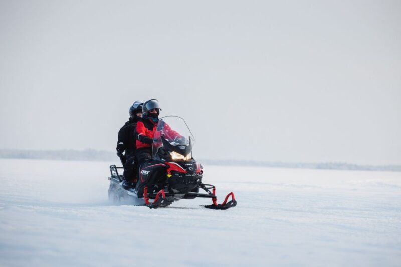 Rovaniemi: Ice Fishing & Snowmobile Safari Combo Day - Snowmobiling Across Arctic Forests and Frozen Lakes