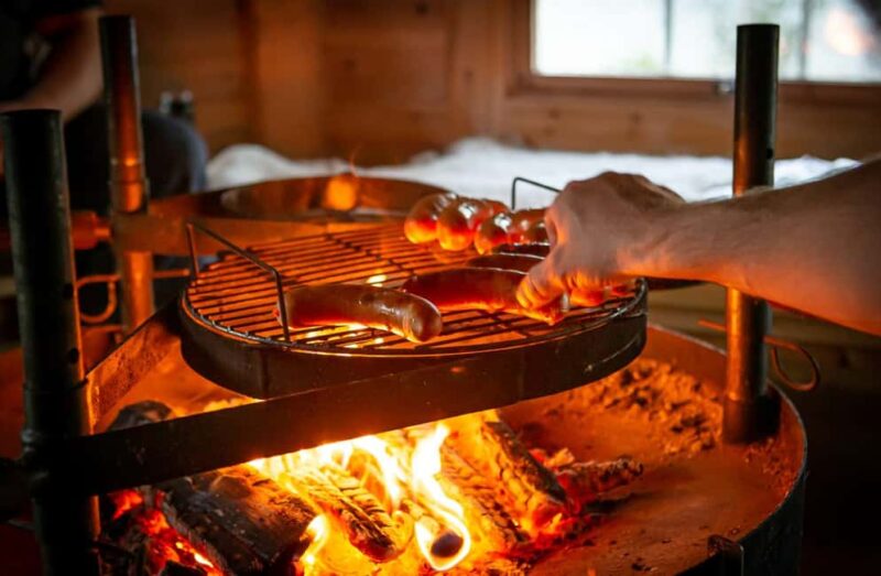 Rovaniemi: Northern Lights Tour with Finnhorses Sleigh Ride - Enjoying the Campfire and Finnish Sausages