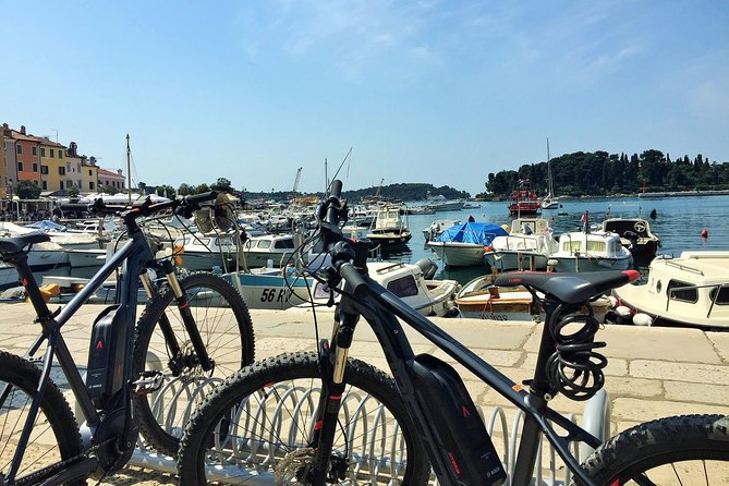 Rovinj private biking tour by electric powered bike - Scenic Ride Toward Punta Corrente and Coastal Trails