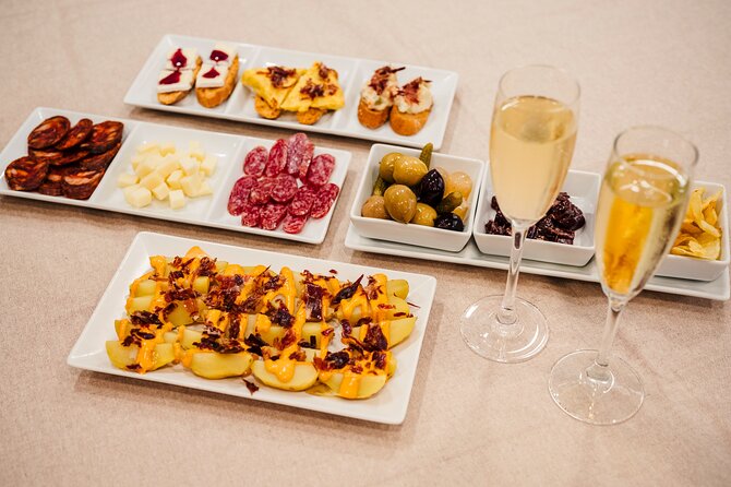 Sagrada Familia Jamon & Tapas Tasting Experience - Key Points