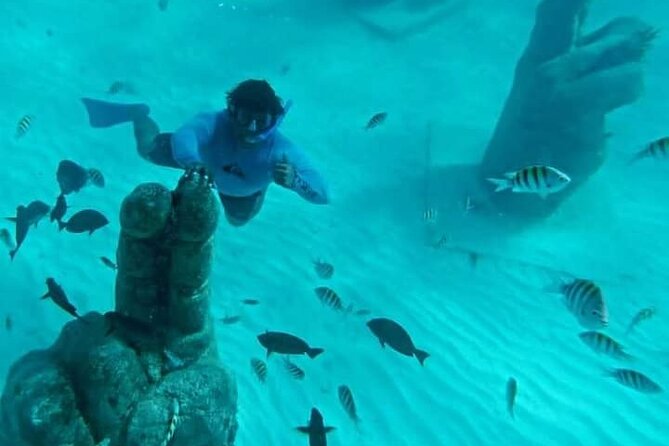 Sail Away Catamaran Day Trip with Snorkeling to Isla Mujeres - Snorkeling at El Meco Reef with Professional Guides