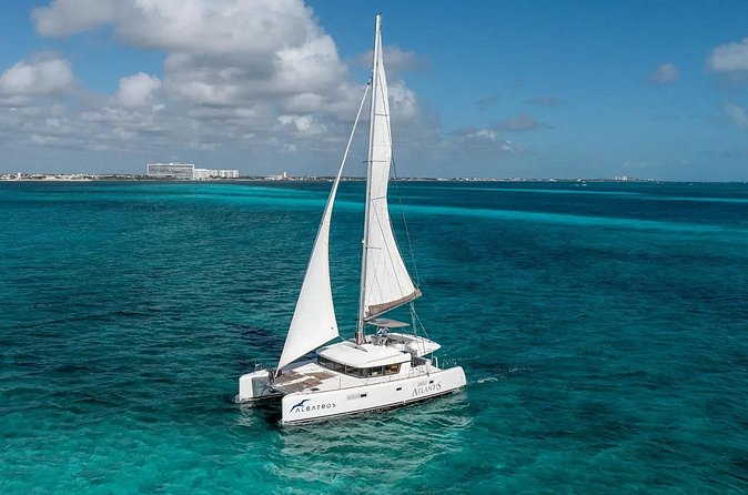 Sail to Paradise Catamaran Tour with Snorkel and Beach Club - Practical Details and Booking Information