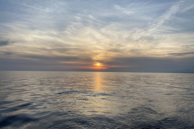 Sailing at sunset along the cliffs of Maro-Compartida - Spectacular Sunset Sailing Along the Cliffs of Maro-Compartida for $81