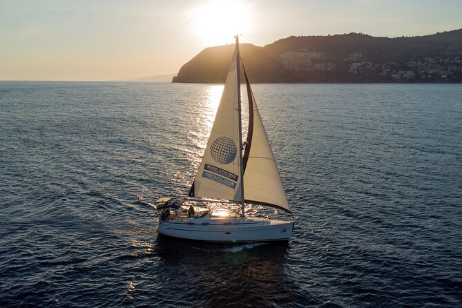 Sailing at sunset along the cliffs of Maro-Compartida - Booking and Flexibility
